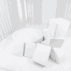A luxury all-white soft play setup featuring a chic ball pit, white foam climbing blocks, and a mini slide on a clean white play mat
